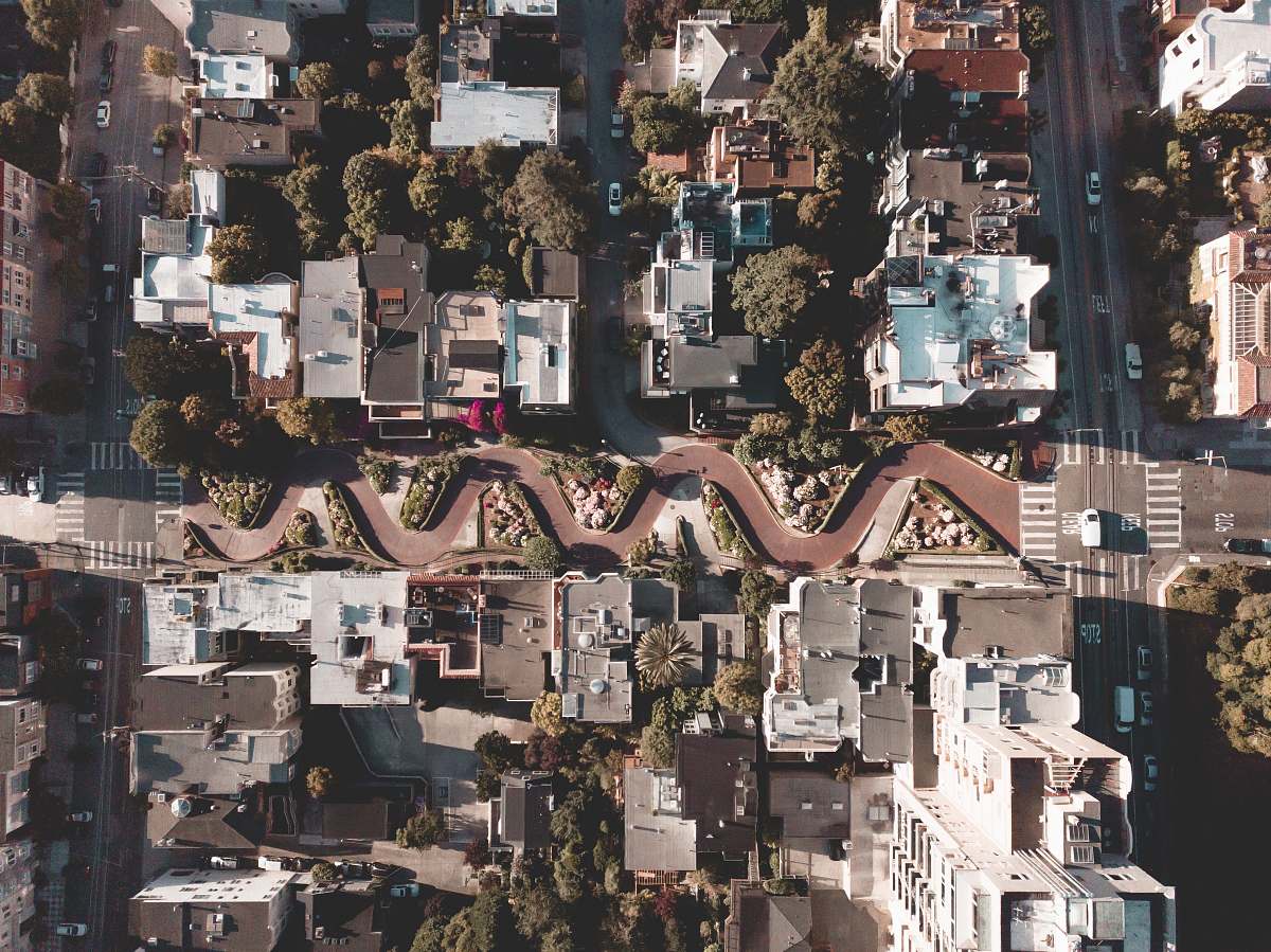 landscape aerial photography of buildings near road nature